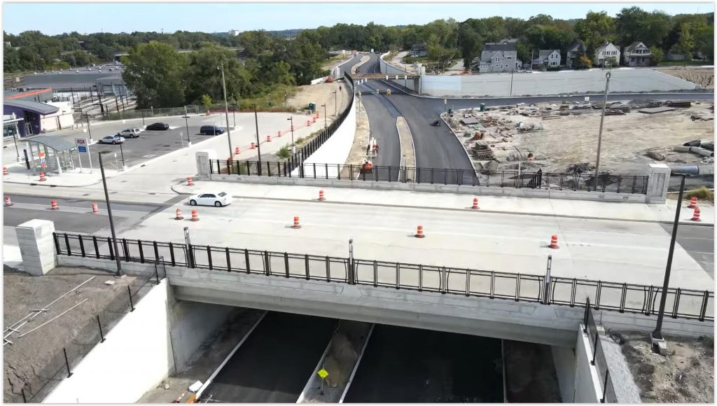 Opportunity Corridor at East 55th Street with the RTA station at left.