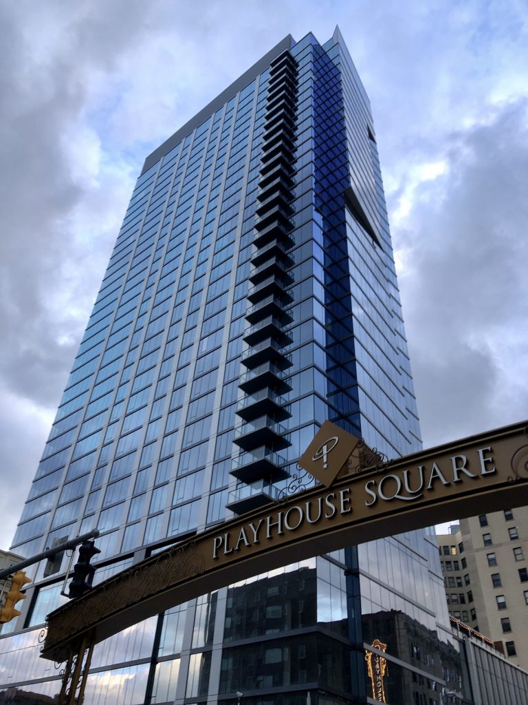 The Lumen tower and the Playhouse Square district welcome sign over Euclid Avenue.