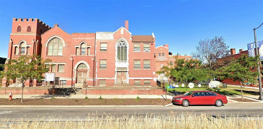 St. Luke and Pearl Road churches set side-by-side in the heart of Old Brooklyn. One will be demolished and the other saved.