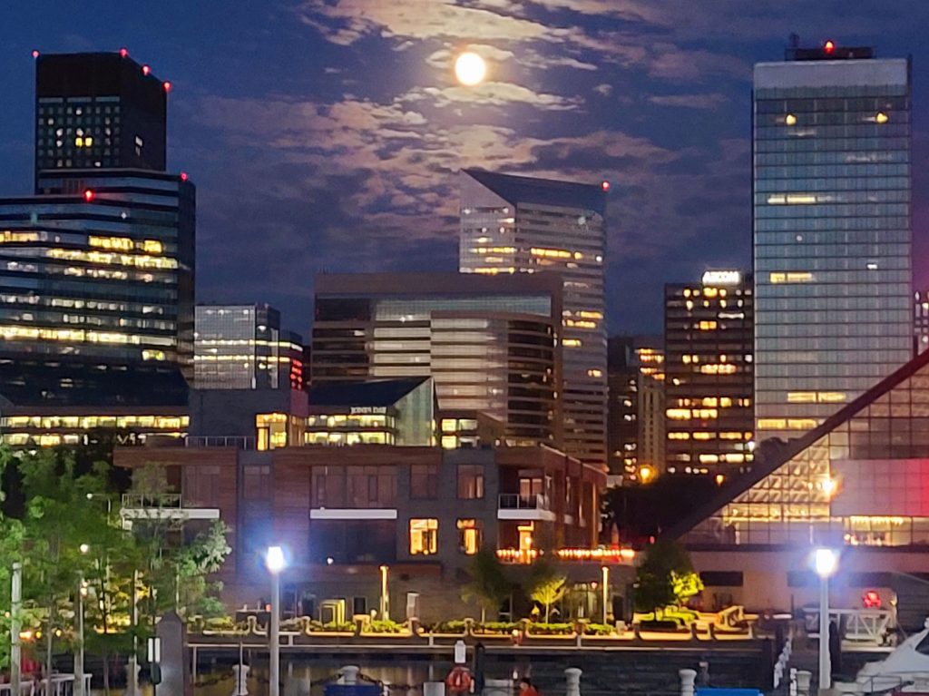 Skyline view of downtown Cleveland from North Coast Harbor on a warm summer evening with 45 Erieview in the center of it.