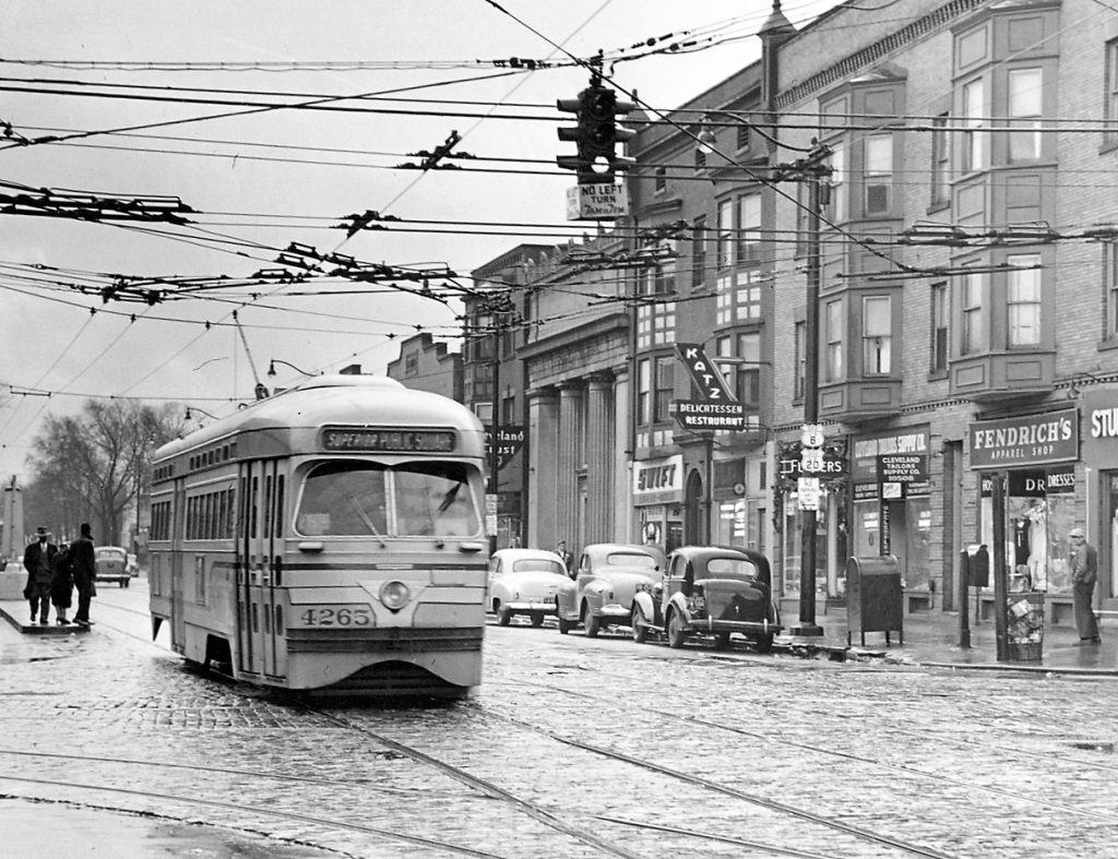 Historical photo of the East 105th Street and Superior Avenue intersection with a streetcar heading to downtown Cleveland from Glenville.