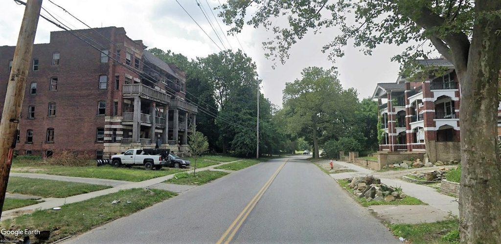 Two apartment buildings with two very different fates face each other on East 89th Street in Hough.